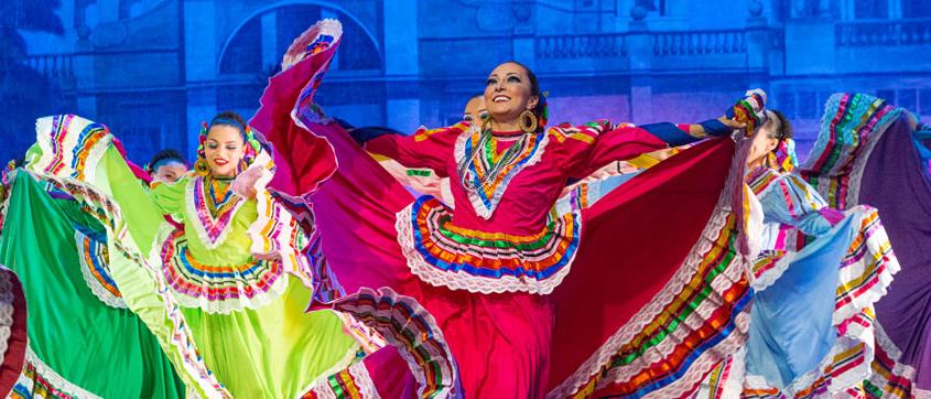 Folklorico dancers whipping their colorful dresses.